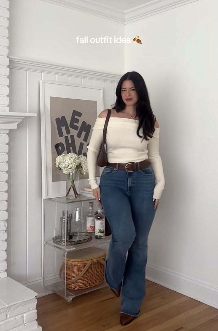 Cream Off-Shoulder Sweater + Blue Straight-Leg Jeans + Brown Belt